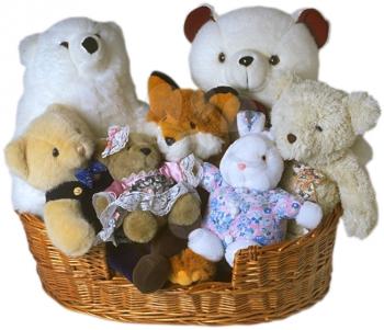 Royalty Free Photo of a Basket Full of Stuffed Animals 