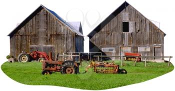 Royalty Free Photo of Two barns and a Tractor
