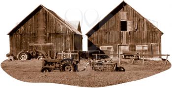 Royalty Free Sepia Tone Photo of Two barns and Tractors