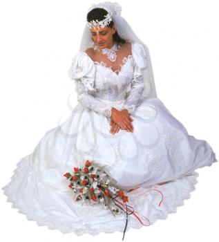 Royalty Free Photo of a Bride Kneeling Down