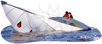 Royalty Free Photo of a Sailboat Capsizing