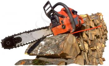 Royalty Free Photo of a Chainsaw on a Pile of Wood