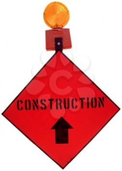 Royalty Free Photo of a Construction Sign with a Light