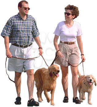 Royalty Free Photo of Two People Walking Dogs