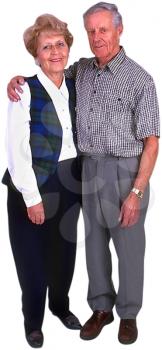 Royalty Free Photo of an Elderly Couple Standing Together with His Hand Around Her