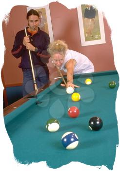 Royalty Free Photo of a Couple Playing Pool