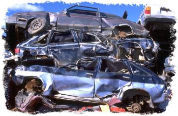 Royalty Free Photo of Cars in a Scrap Yard