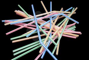 Color straw isolated on the black background.