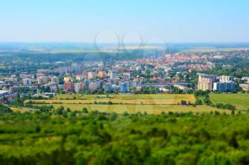 Tilt shift landscape panorama of the Kutna Hora city and forest in the Czech Republic.