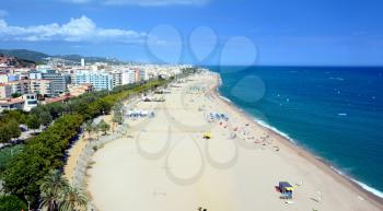Beach of the seaside town Calella, part of the Costa Brava destination in Catalonia, Spain.