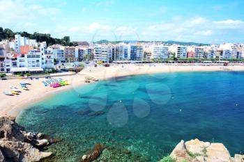 Beach of the seaside town Blanes, part of the Costa Brava destination in Catalonia, Spain.