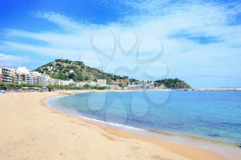 Beach of the seaside town Blanes, part of the Costa Brava destination in Catalonia, Spain.