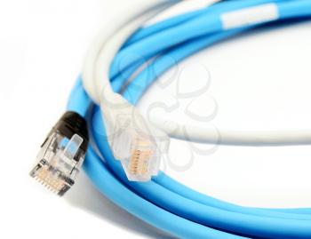 Blue and gray ethernet Cat5e cables on a white background.