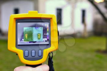 Recording Heat Loss of the House with Infrared Thermal Camera in Hand. 