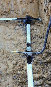 Galvanized Lightning Conductor Strip Put in a House Foundation.