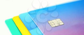 Stack of multicolored credit cards collection on white background.