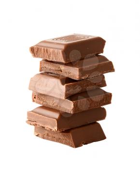 Stack of chocolate pieces isolated over white background.
