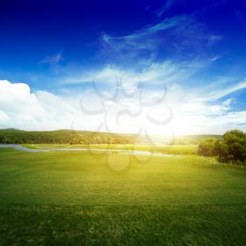 Natural landscape. Meadow and river nature background