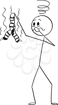 Cartoon stick figure drawing conceptual illustration of man holding stinking, stinky or smelly pair of dirty socks and feels sick because of the smell.