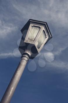 Street lamp and clouds