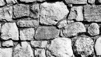 The wall made of stone black and white background