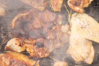 Grilled Deboned Chicken Meat On Smoking Barbecue With Rosemary