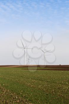 Wind Turbine Farm. Green Renewable Energy. Electricity Technology Concept