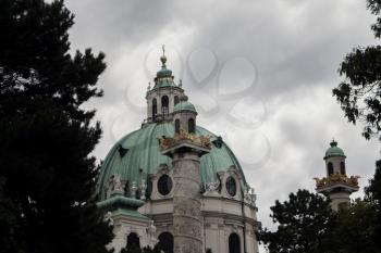 Karlskirche Church In Vienna Austria On Dramatic Cloudy Day