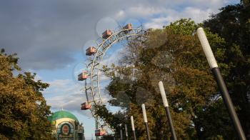 VIENNA, AUSTRIA - AUGUST 16, 2019 -  Ferris Wheel at Amusement Park Prater on August 16, 2019 in Vienna, Austria 

