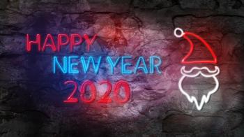 Happy New Year 2020. Glowing Neon Sign with Santa Claus Against Brick Wall 
