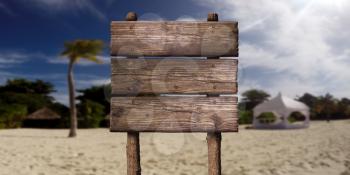 Wooden Board Sign at Sandy Beach at Tropical Island. Summer Vacation Concept