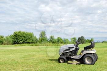 Lawn with riding lawn mower