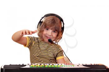 happy little girl play keyboard