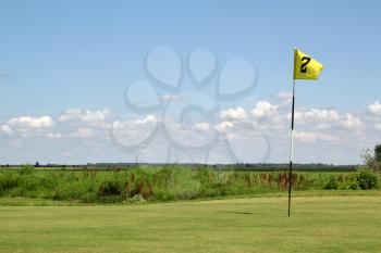 yellow golf flag number two