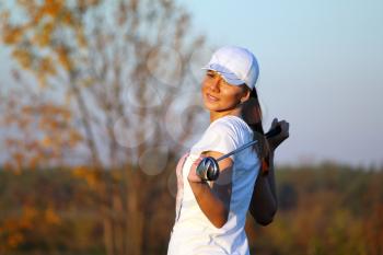 girl golf player outdoor portrait