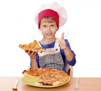happy boy chef with pizza and thumb up