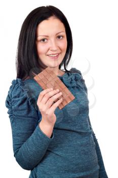 happy teenage girl eating chocolate