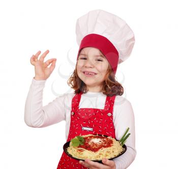 happy little girl cook with spaghetti