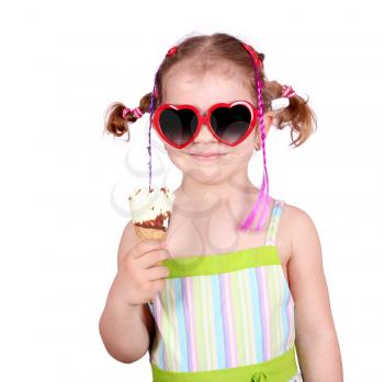 little girl with sunglasses eat ice cream on white 