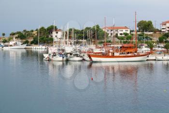 port with sailboat and fishing boat