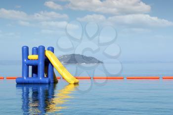 summer vacation scene with water slide 