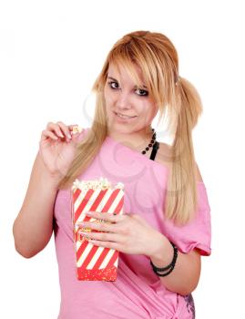 beautiful teenage girl eat popcorn