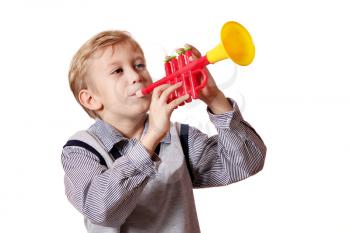 boy play trumpet on white 