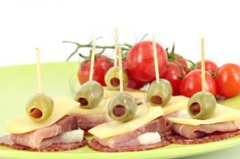 ham cheese olives and tomatoes buffet food