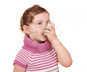 little girl with asthma inhaler