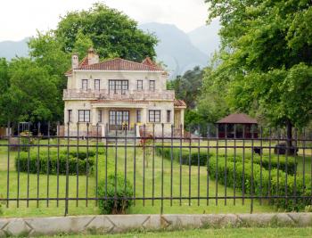 luxury stone little castle with hedgerow yard