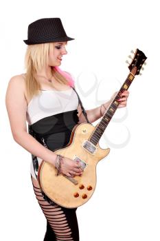 girl with hat play electric guitar