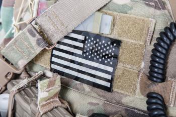 American flag stars stripes military patch on camouflage uniforms