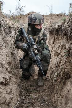 Paratrooper of french 1st Marine Infantry Parachute Regiment RPIMA in entrenchments