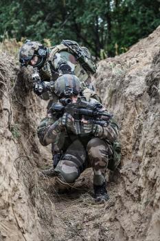 Paratroopers of french 1st Marine Infantry Parachute Regiment RPIMA in entrenchments